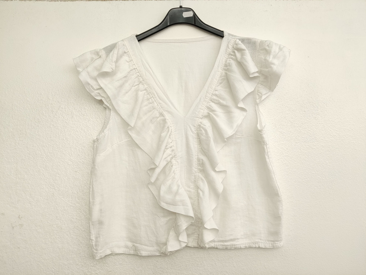 Blusa de lino con volante