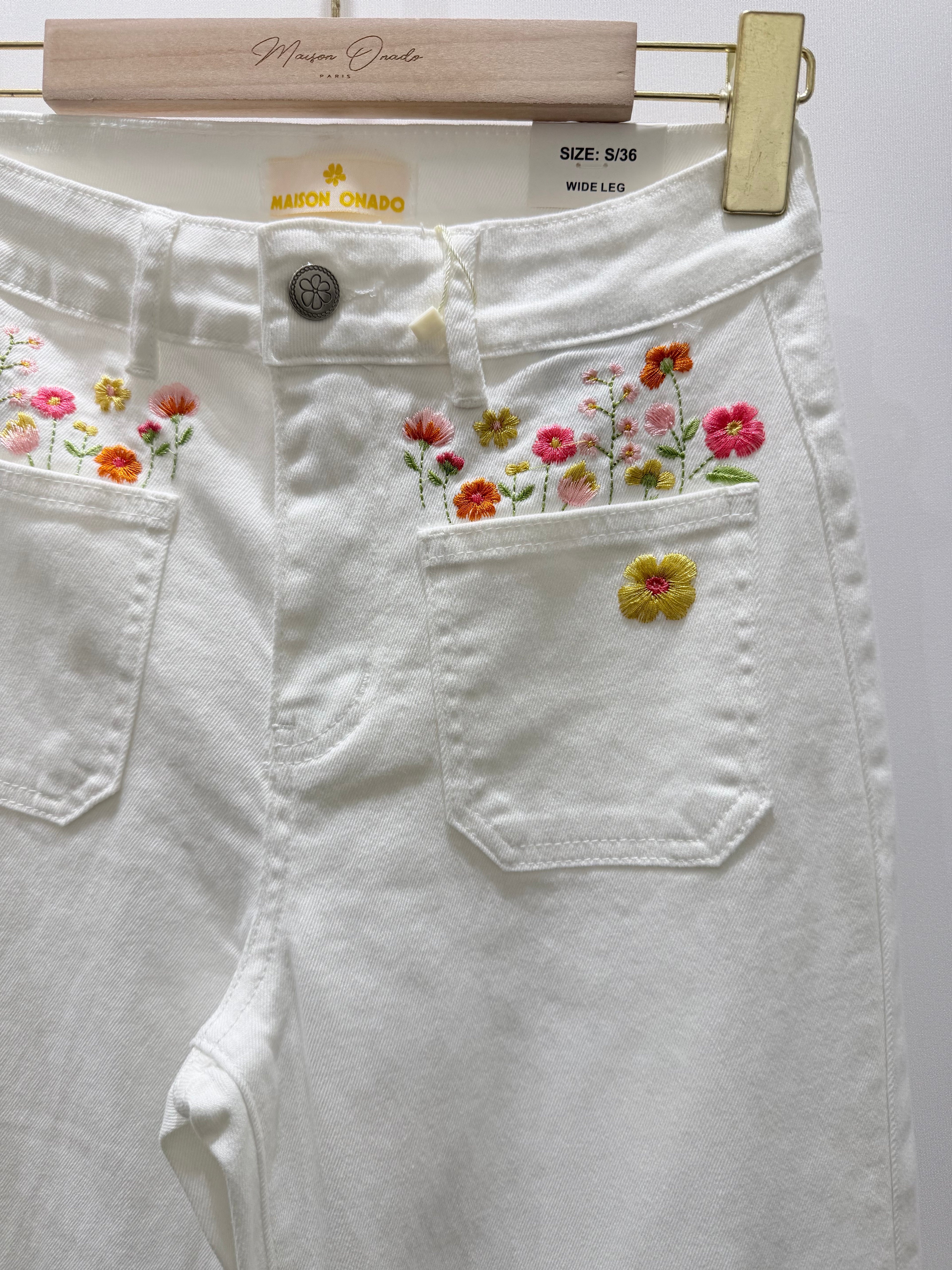 Calças bolso bordado