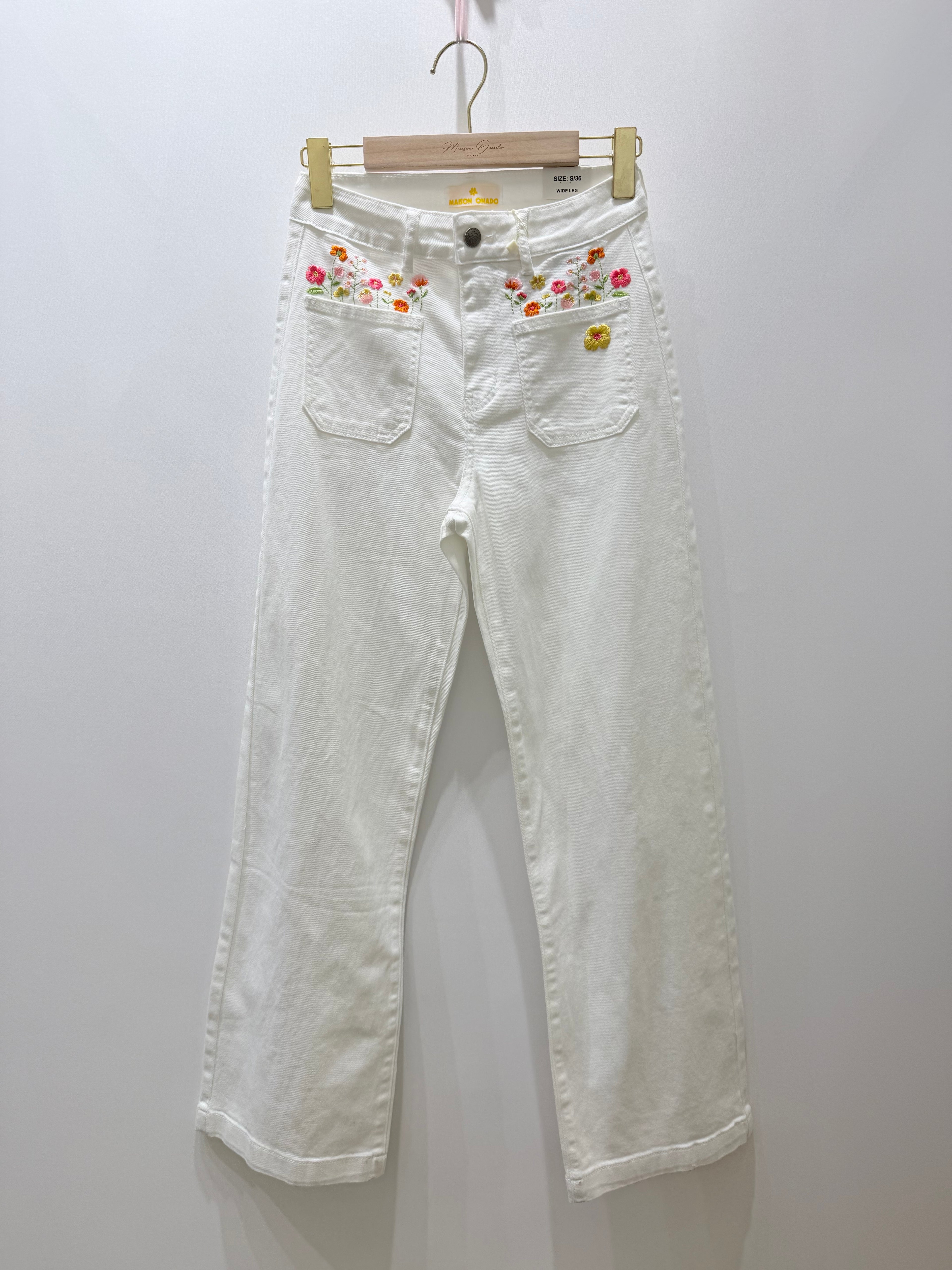 Calças bolso bordado