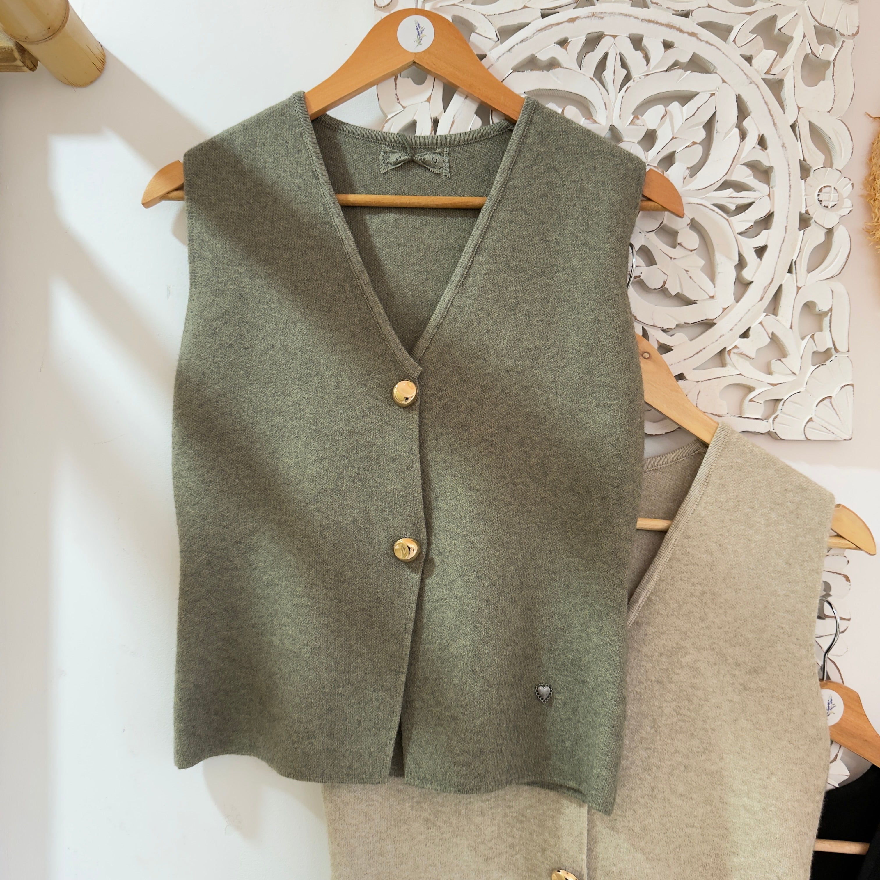 Colete botões dourados